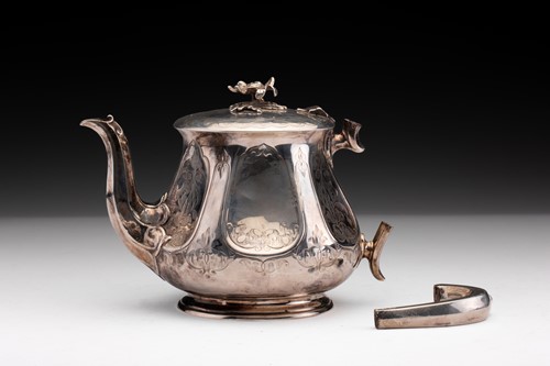 Lot 381 - A Victorian silver teapot with flowerhead...