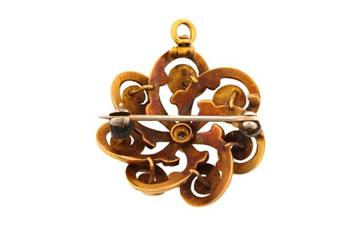 Lot 254 - A Victorian pinwheel pendant brooch with...