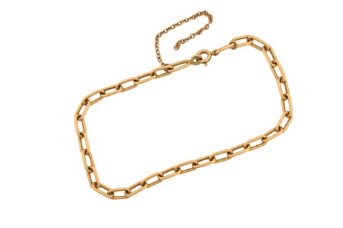 Lot 251 - A cable chain bracelet in 18ct yellow gold, of...