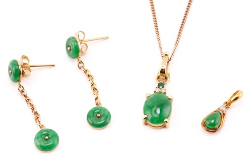 Lot 241 - Two jade pendants and a pair of drop earrings;...