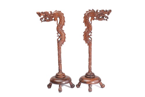 Lot 170 - A close pair of Chinese carved wood lantern...