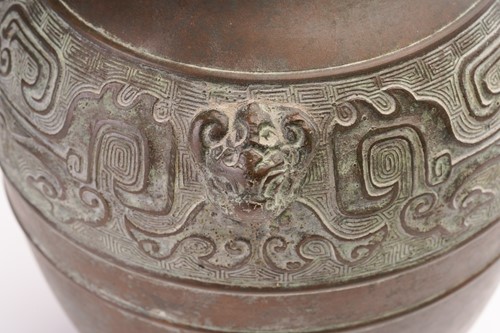 Lot 166 - A Chinese cast brass figure of standing Buddha,...