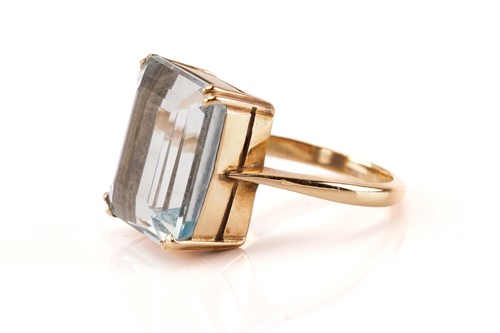 Lot 155 - An aquamarine solitaire ring, composed of an...