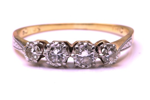 Lot 118 - A four-stone Diamond half hoop ring, featuring...