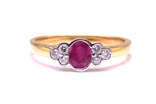 Lot 38 - A ruby and diamond ring in 18ct gold,...