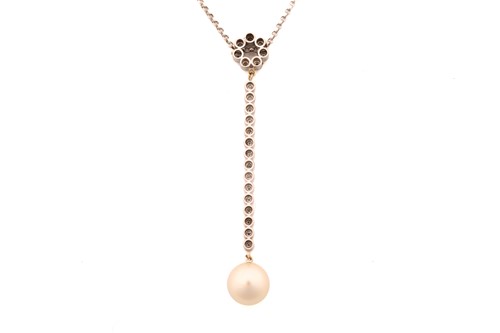 Lot 256 - A pearl and diamond drop pendant on chain, the...