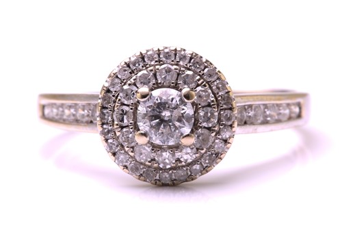 Lot 92 - An 18ct white gold diamond set cluster ring,...