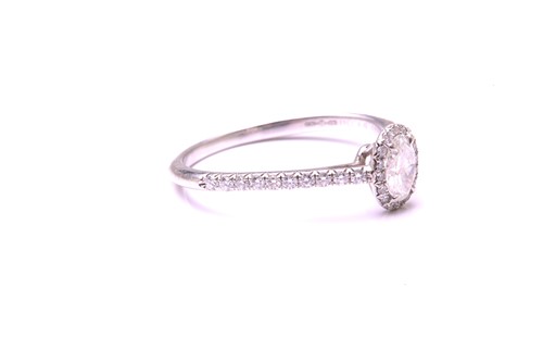 Lot 259 - A Tiffany & co. diamond set halo ring,...