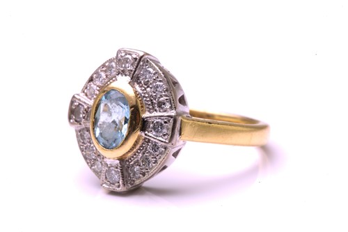 Lot 69 - An aquamarine and diamond cocktail ring in...