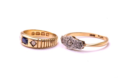 Lot 235 - Two gem set rings, the first ring is set with...