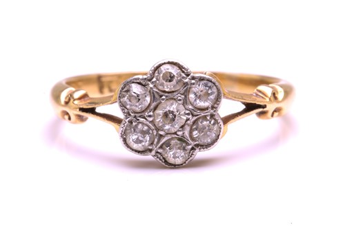 Lot 244 - An old cut diamond daisy cluster ring,...