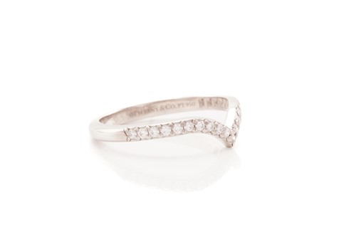 Lot 57 - Tiffany & Co. - Soleste V band ring set with...