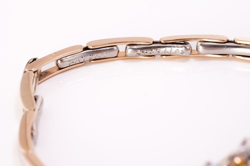 Lot 111 - A demantoid garnet and diamond bracelet,...
