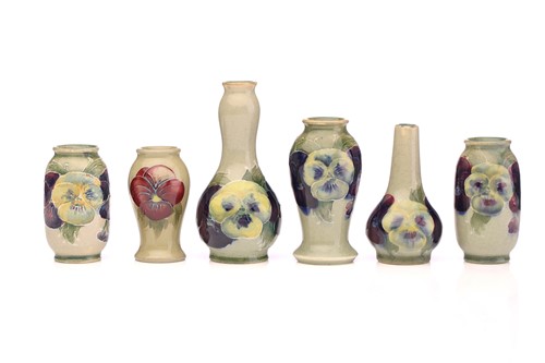 Lot 133 - Six Moorcroft miniature vases, 'Pansy' pattern...