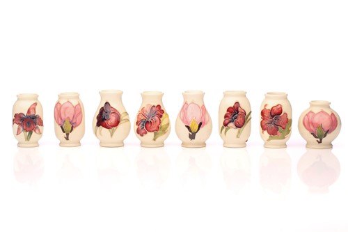Lot 59 - Eight Moorcroft miniature vases, 1970s,...