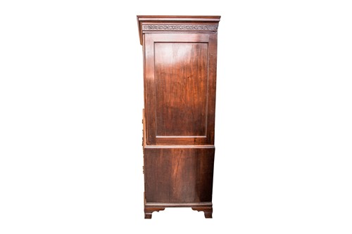 Lot 299 - A George III mahogany linen press, the...