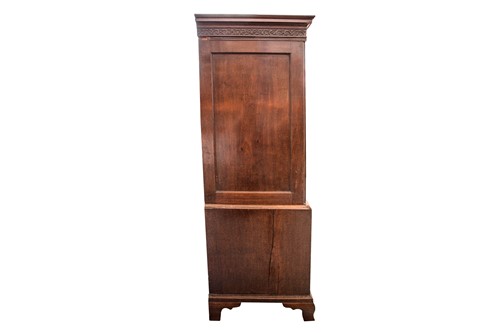 Lot 299 - A George III mahogany linen press, the...