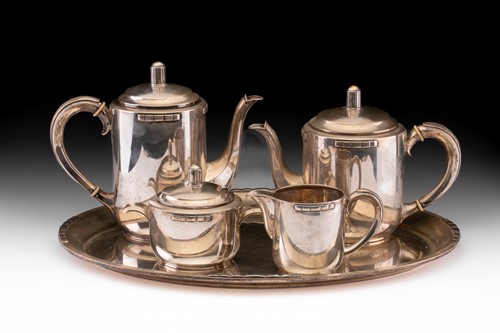 Lot 353 - An Art Deco Danish white metal five piece tea...