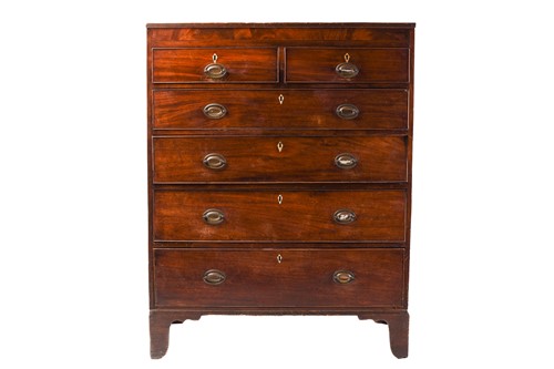 Lot 262 - A large George III mahogany chest of two short...
