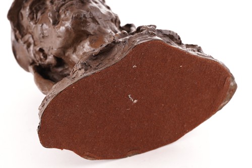 Lot 416 - A cold cast bronzed resin bust of Dr. David...