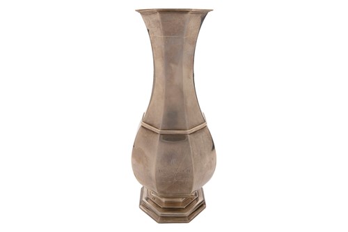 Lot 384 - A silver vase; of panelled baluster form on...