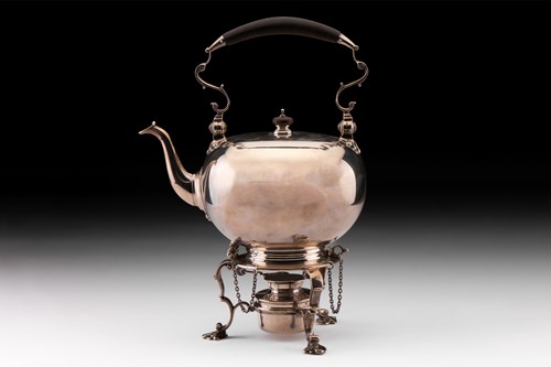 Lot 362 - An American tea kettle on stand by Howard & Co....