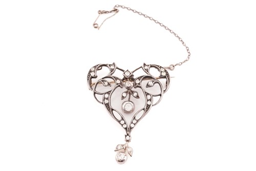 Lot 291 - An Edwardian diamond brooch; cartouche shape...