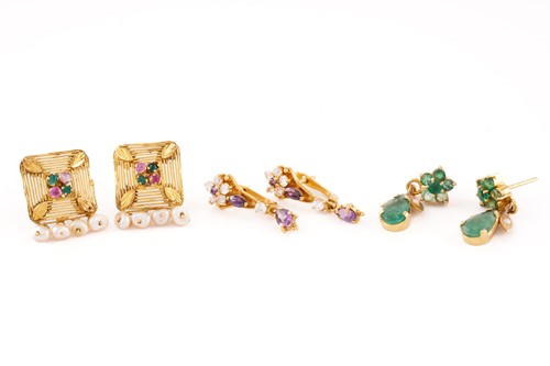 Lot 142 - Three pairs of gem-set earrings in high carat;...
