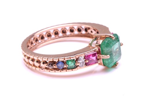 Lot 128 - A multi-gem set dress ring, centrally set with...