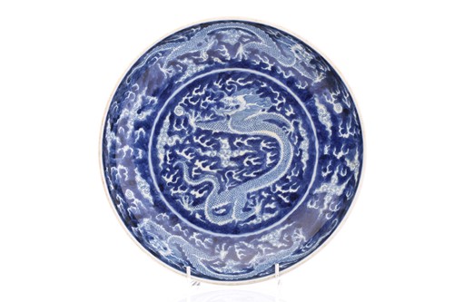 Lot 220 - A Chinese porcel;ain blue & white dragon dish,...