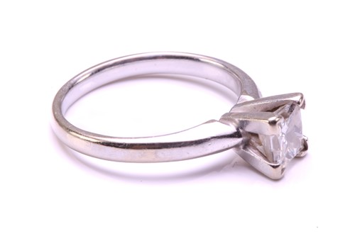 Lot 71 - A single-stone diamond ring. The princess cut...