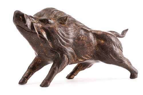 Lot 133 - A Chinese bronze figure of a boar, standing on...