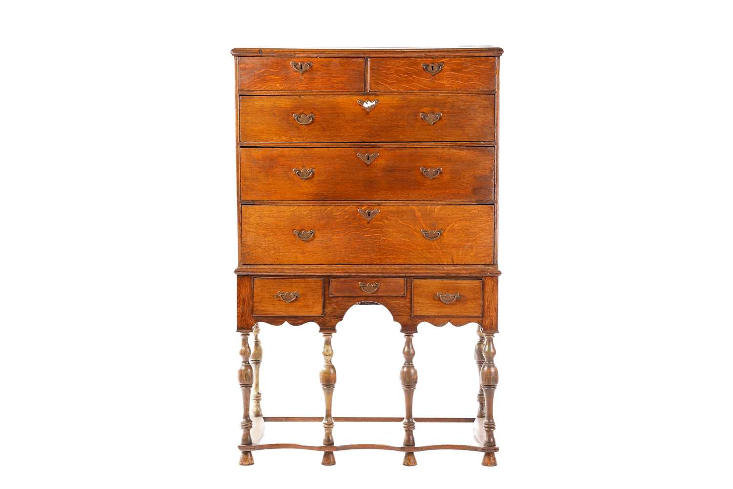 Lot 249 - An 18th century oak chest on later stand, the...