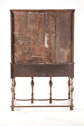 Lot 249 - An 18th century oak chest on later stand, the...