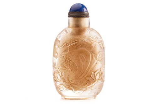 Lot 189 - A Chinese moulded glass snuff bottle, relief...