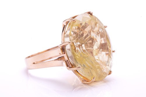 Lot 238 - A large citrine ring, featuring an oval...