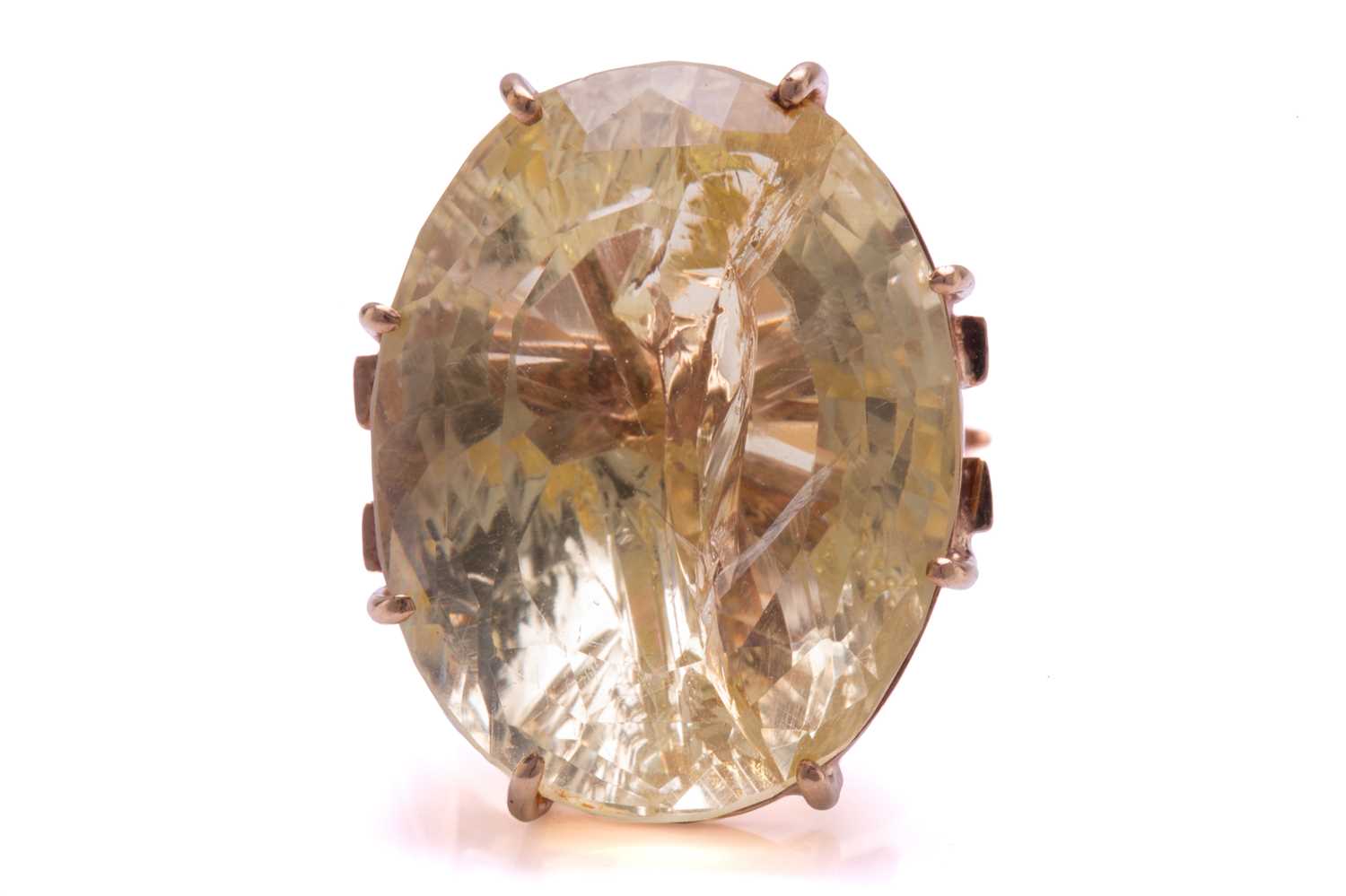 Lot 238 - A large citrine ring, featuring an oval...