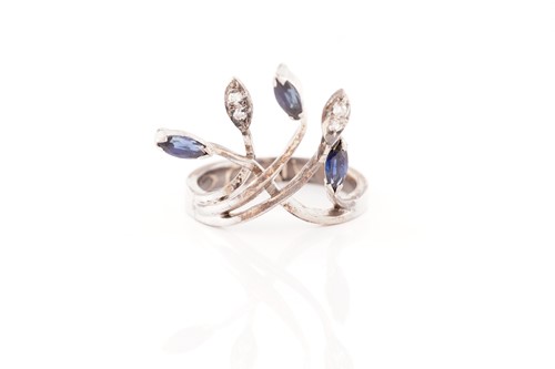 Lot 173 - A sapphire and diamond spray ring; the...