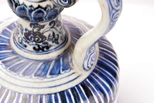 Lot 138 - A Chinese porcelain blue and white ewer, of...