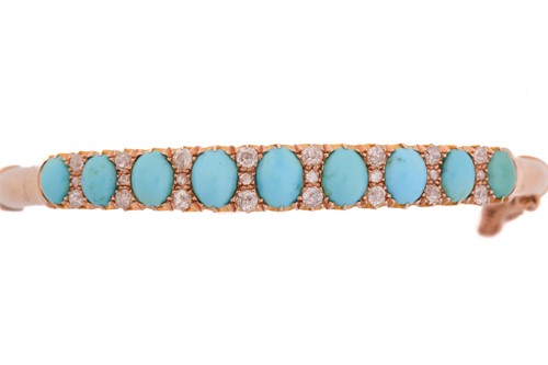 Lot 199 - A turquoise and diamond hinged bangle in...