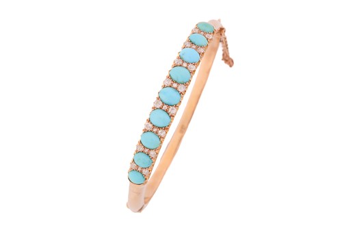 Lot 199 - A turquoise and diamond hinged bangle in...