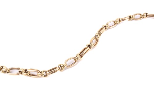 Lot 141 - A fancy cable link bracelet, with double links...