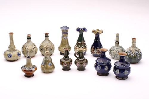 Lot 76 - A collection of fourteen Doulton stoneware...