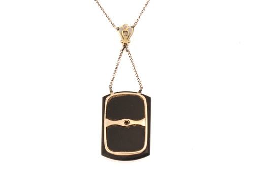 Lot 94 - An Art Deco style onyx and diamond necklace,...