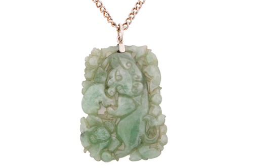 Lot 198 - A carved jade pendant, in rectangular form,...