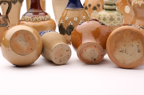 Lot 42 - Ninteen Doulton stoneware miniature vases and...