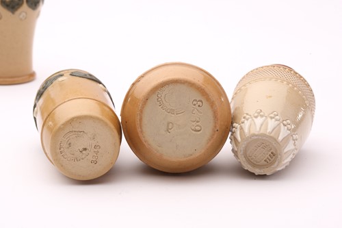 Lot 42 - Ninteen Doulton stoneware miniature vases and...