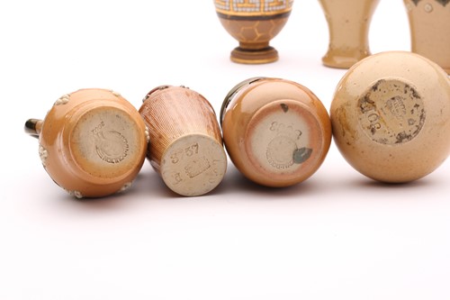 Lot 42 - Ninteen Doulton stoneware miniature vases and...