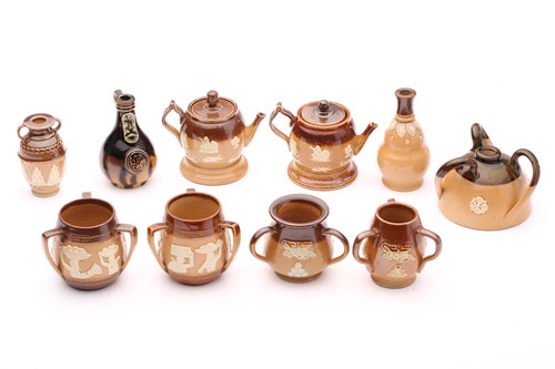 Lot 120 - Ten Doulton stoneware miniatures, including...