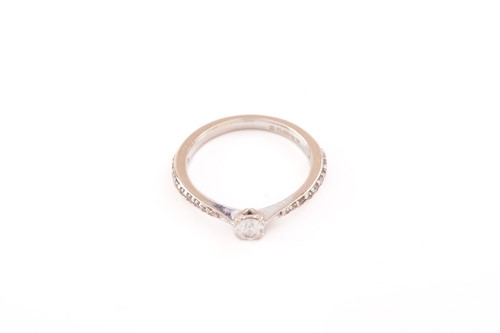 Lot 111 - Two diamond-set rings and a silver ring;...